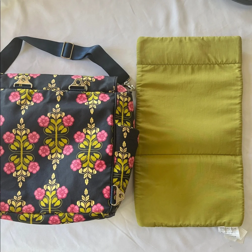 Petunia Pickle Bottom Navy Blue Diaper Bag with Pink and Green Floral Design